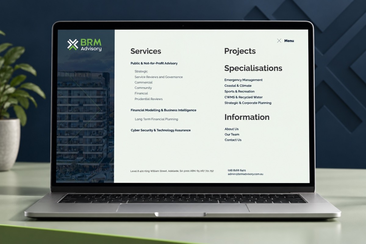 BRM Advisory mega menu displayed on a laptop