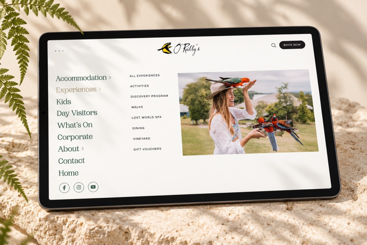 O’Reilly’s website navigation and bird-feeding photography displayed on a tablet.