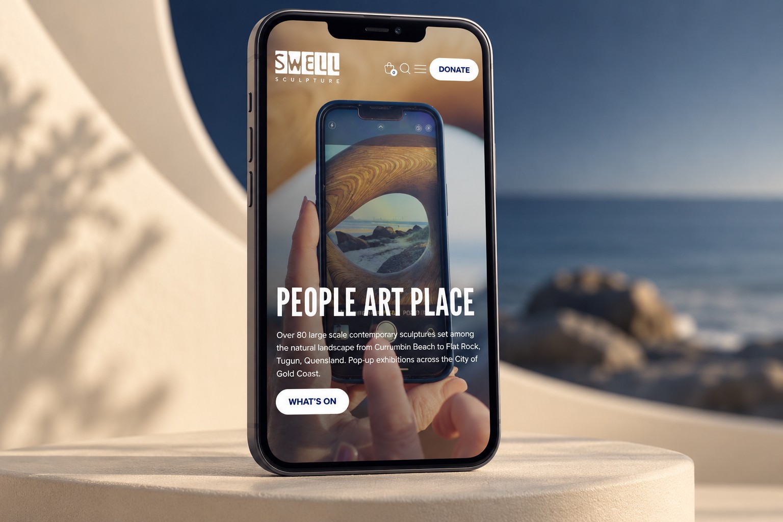 SWELL Sculpture Festival mobile homepage displayed on a smartphone
