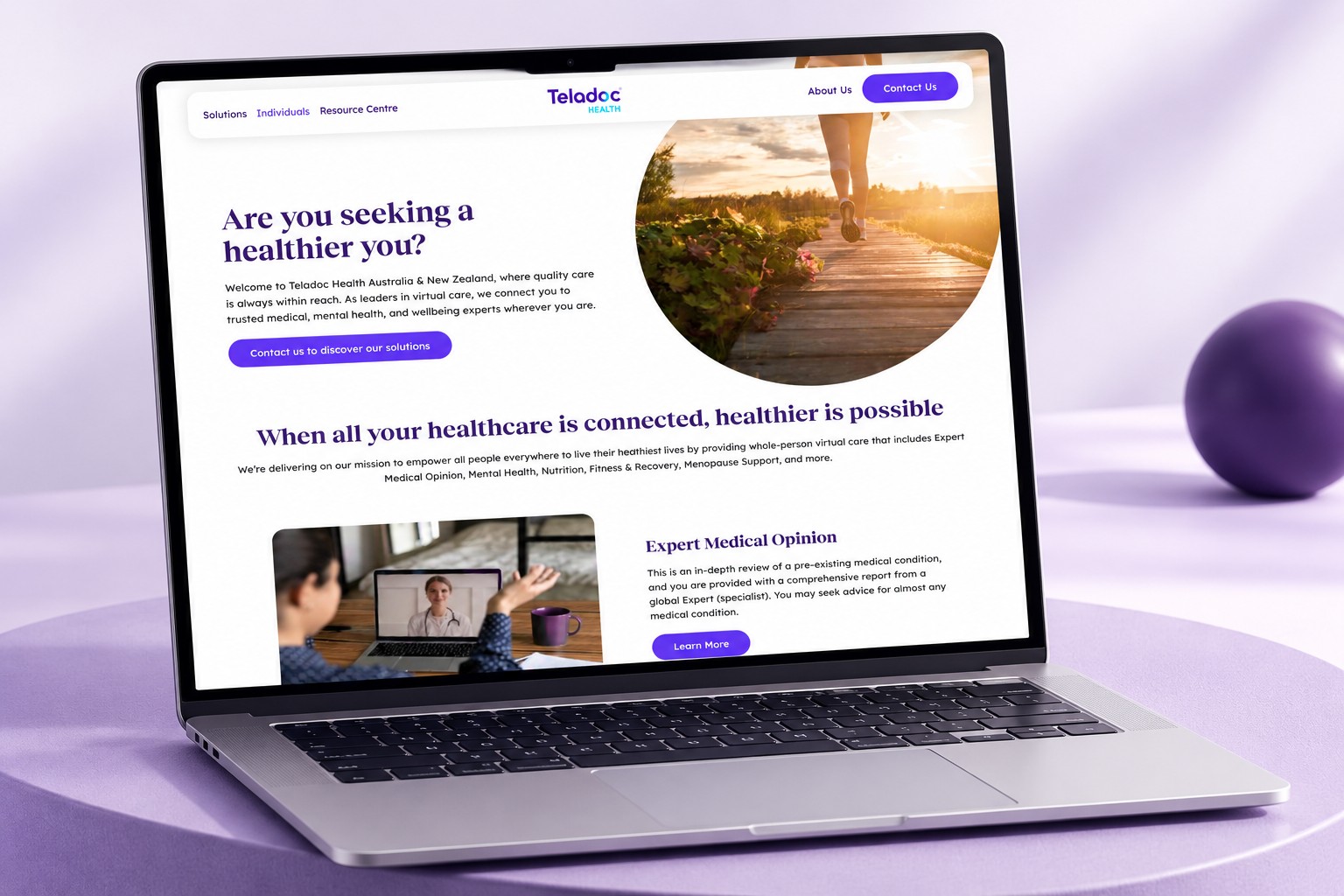 Teladoc Health individuals page displayed on a silver laptop with a lavender backdrop