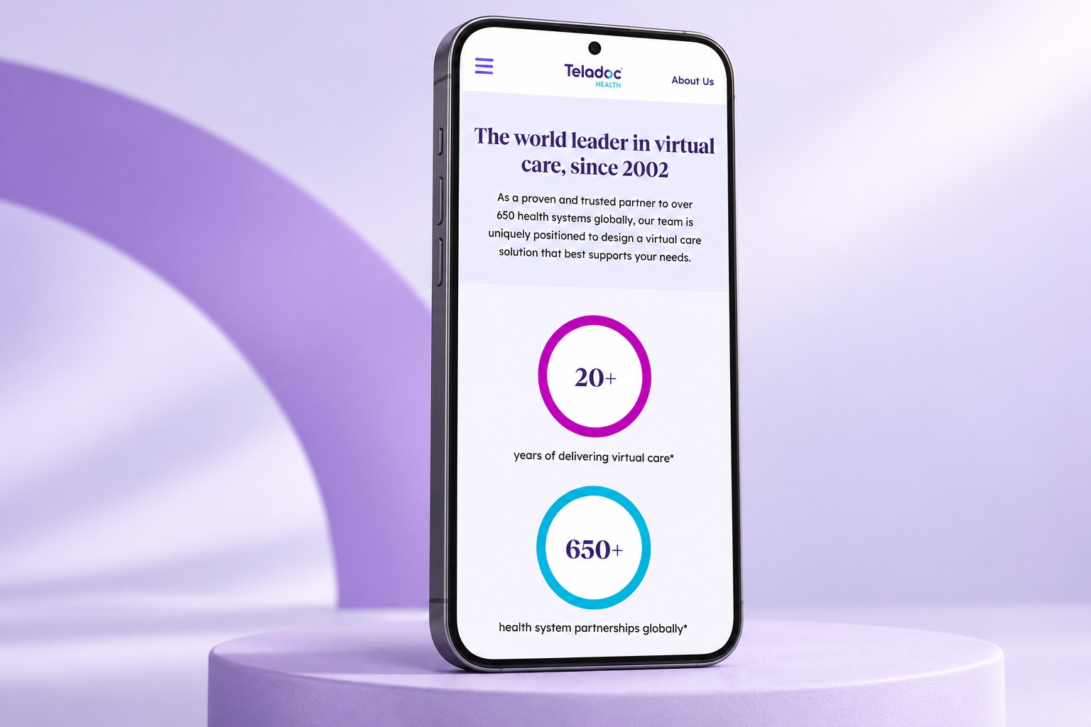 Teladoc Health mobile website displayed on a smartphone in a lavender studio
